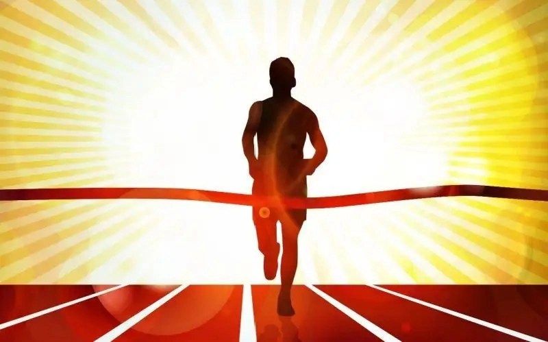 A silhouette of a runner crossing a finish line, with rays of light and a vibrant background.