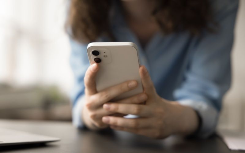 A woman using her smartphone