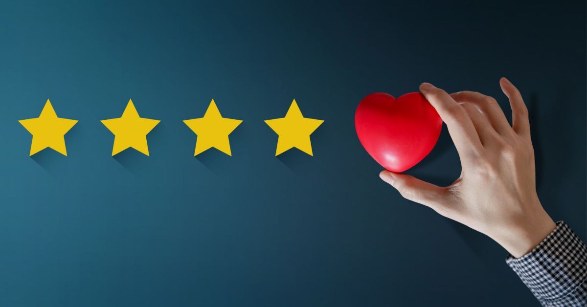 Hand of Happy Client put a Heart on Five Star