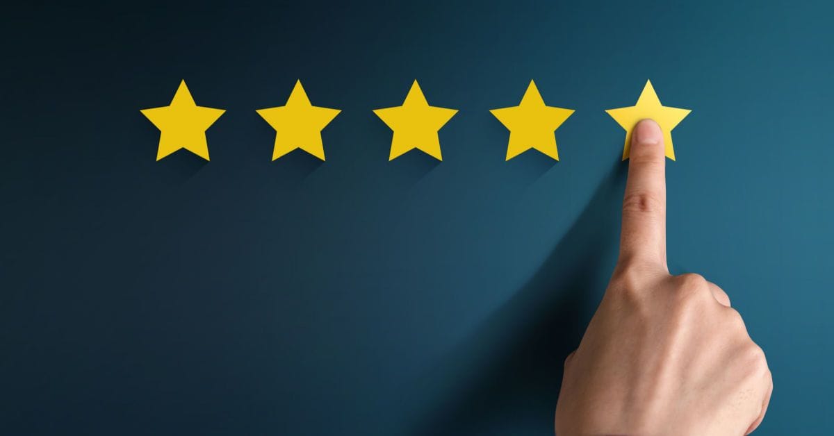 Hand of Client pressing Five Star