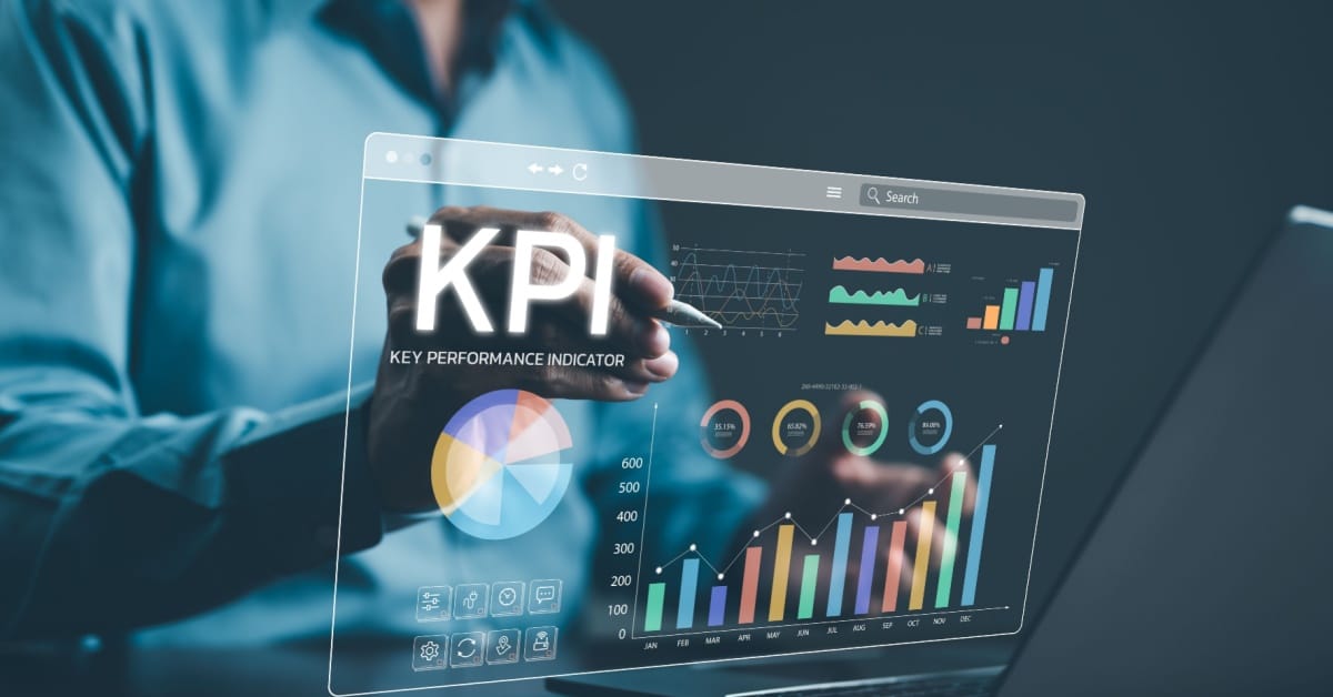 A Manager using digital screen to analyze key performance indicators (KPI) with various graphs and charts.